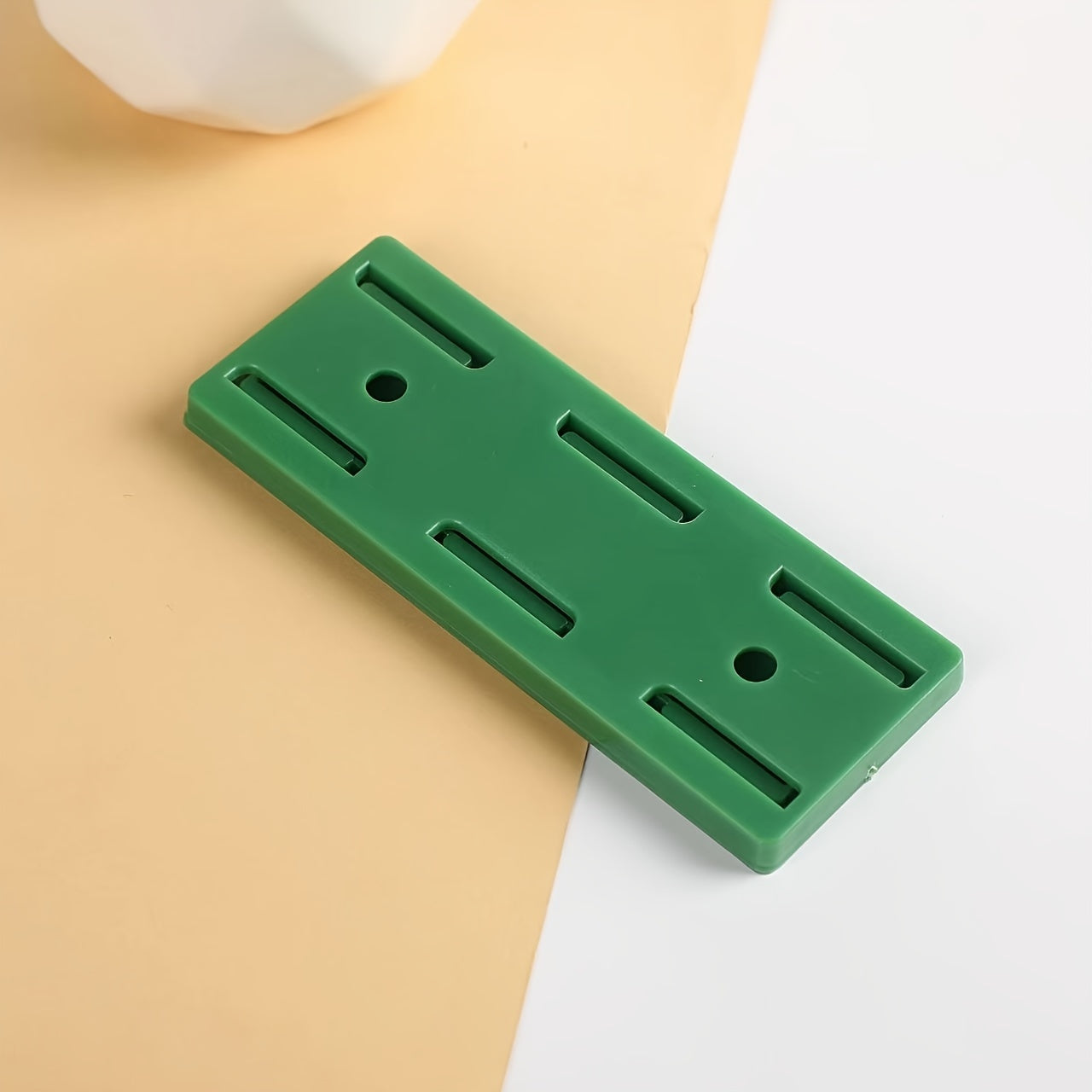 Super durable self-adhesive power outlet holder